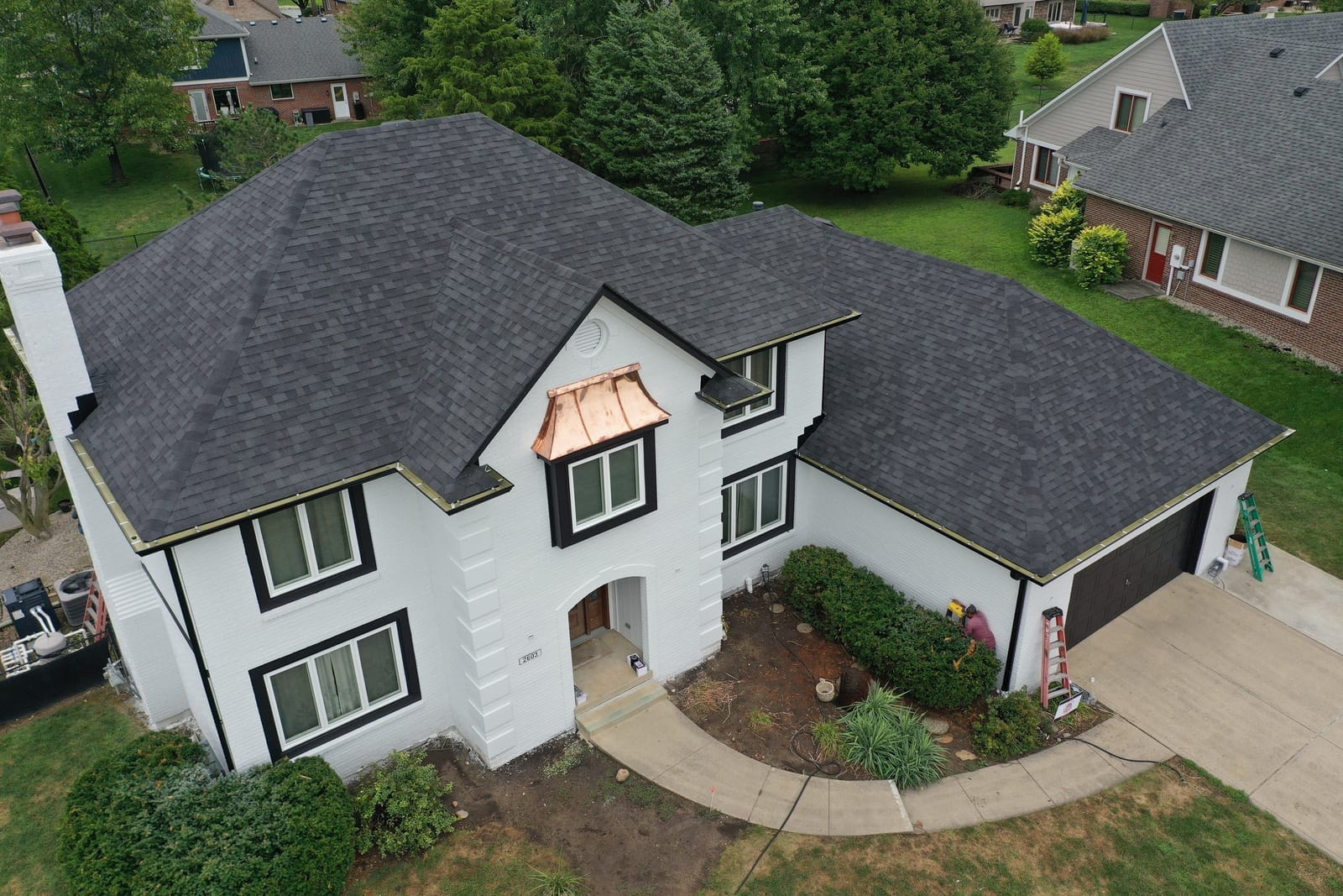 James Hardie lap siding installation on a Greenwood home, aerial view