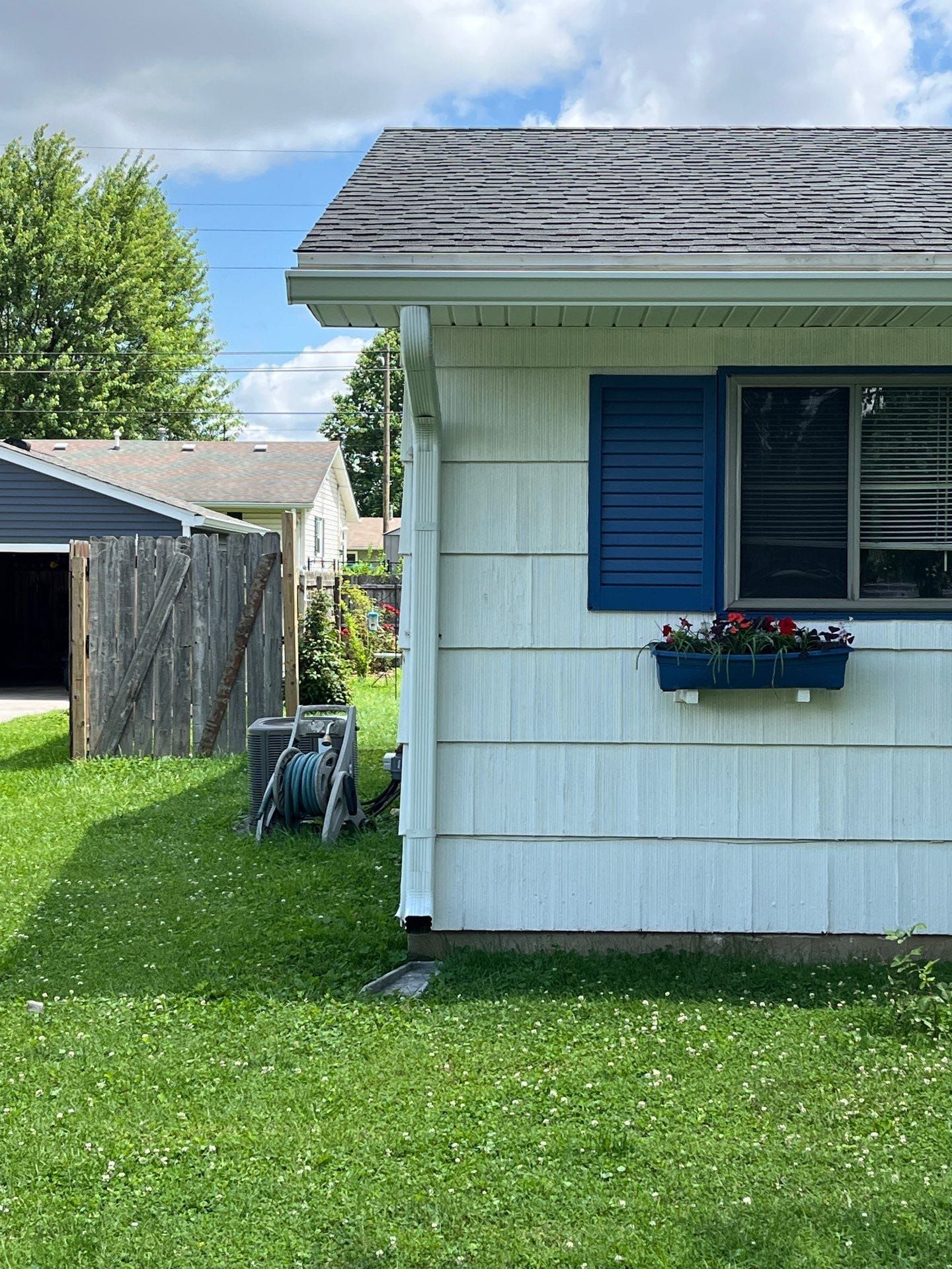 Seamless aluminum gutter installation on a Whiteland home