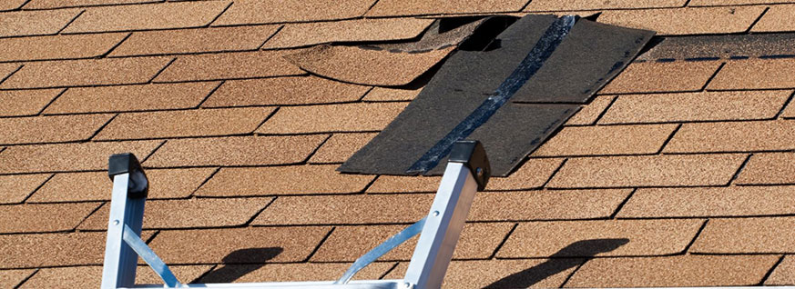 ladder-against-damaged-residential-roof