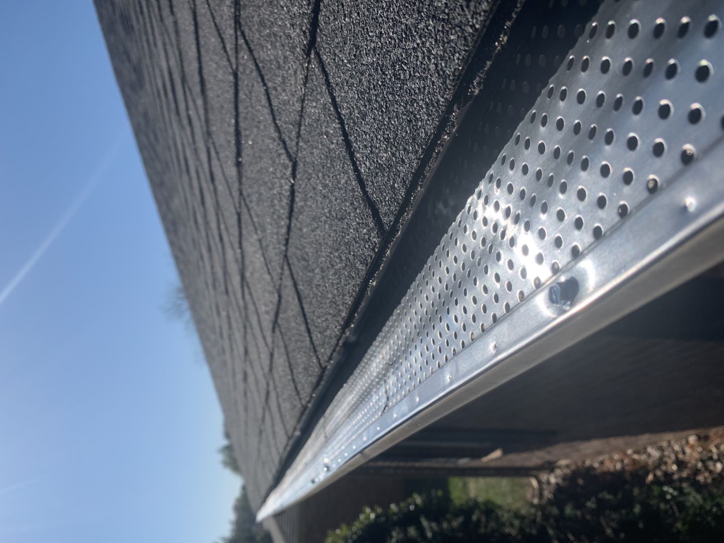 metal-gutter-guards-installed-residential-home
